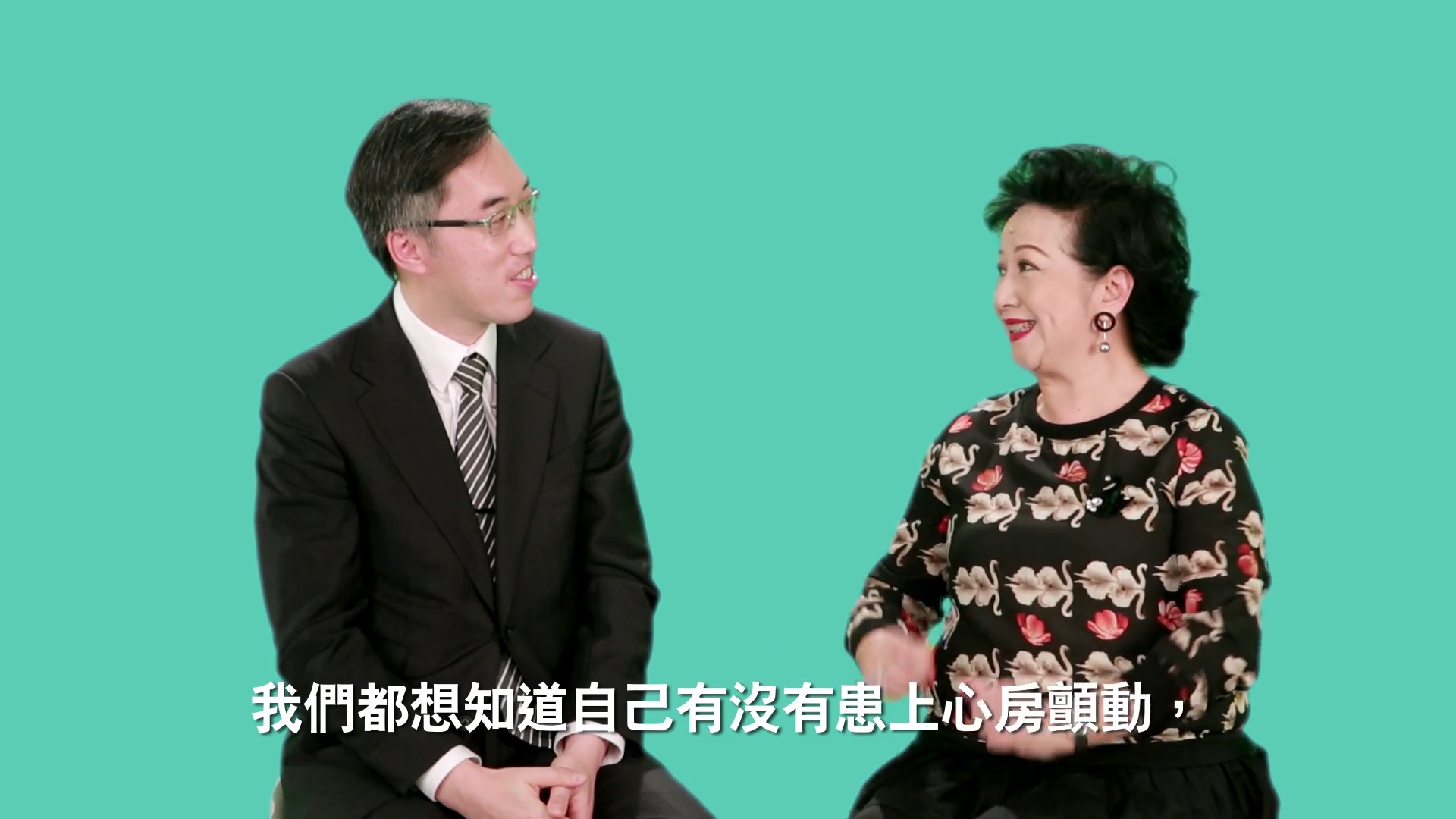 把脈及檢測心律示範：活動大使薛家燕女士及香港心臟專科學院陳藝賢醫生